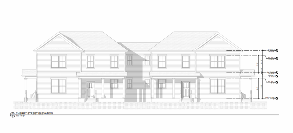 An architectural rendering of new town homes planned for 2601 Cherry Street in the Lower Waverly neighborhood.