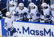 Toronto Maple Leafs left wing Nicholas Robertson (89) celebrates his first career NHL goal with teammates during the second period of an NHL hockey playoff game against the Columbus Blue Jackets Thursday, Aug. 6, 2020, in Toronto. (Nathan Denette/The Canadian Press via AP)