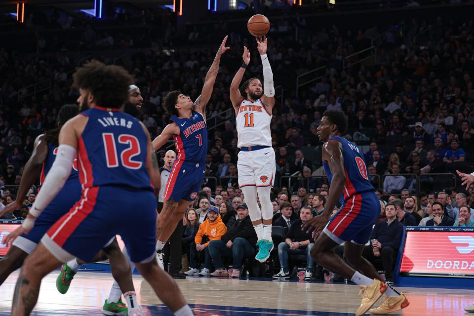 New York Knicks guard Jalen Brunson (11) shoots the ball as Detroit Pistons guard Killian Hayes (7) and center Jalen Duren (0) defend during the first half at Madison Square Garden in New York on Thursday, Nov. 30, 2023.