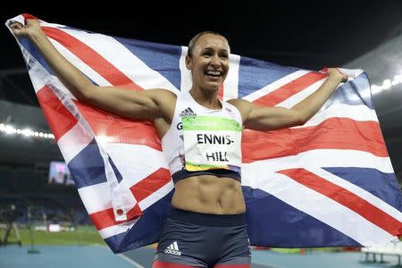 2016 Rio Olympics - Athletics - Final - Women's Heptathlon 800m - Olympic Stadium - Rio de Janeiro, Brazil - 13/08/2016. Jessica Ennis-Hill (GBR) of Britain celebrates winning the silver medal. REUTERS/Phil Noble