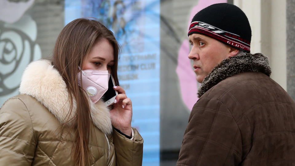 A young woman seen the day after a home isolation order was imposed by the Moscow authorities on citizens of all ages to contain the spread of the COVID-19 coronavirus infection.