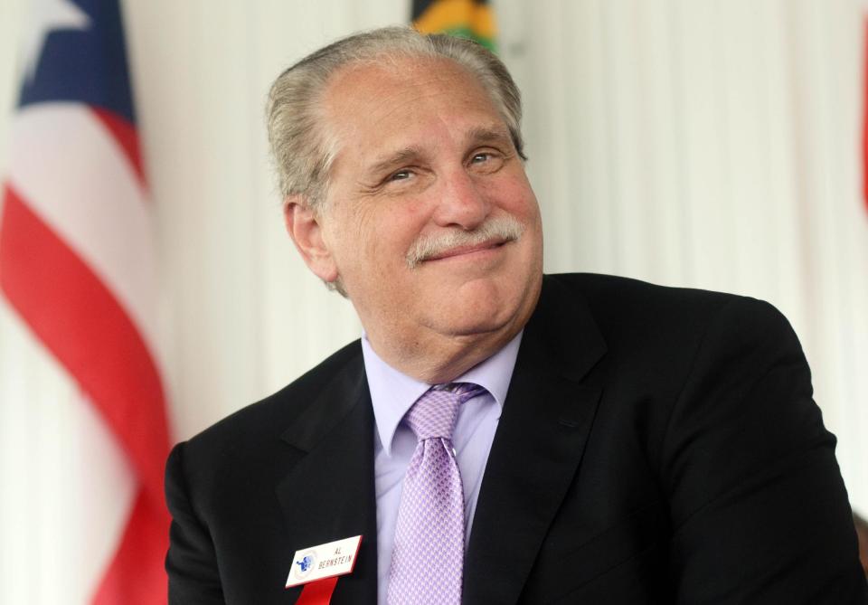 International Boxing Hall of Fame inductee Al Bernstein, a broadcaster, looks out to the crowd during the induction ceremony in Canastota, N.Y., Sunday, June 10, 2012. (AP Photo/Heather Ainsworth)