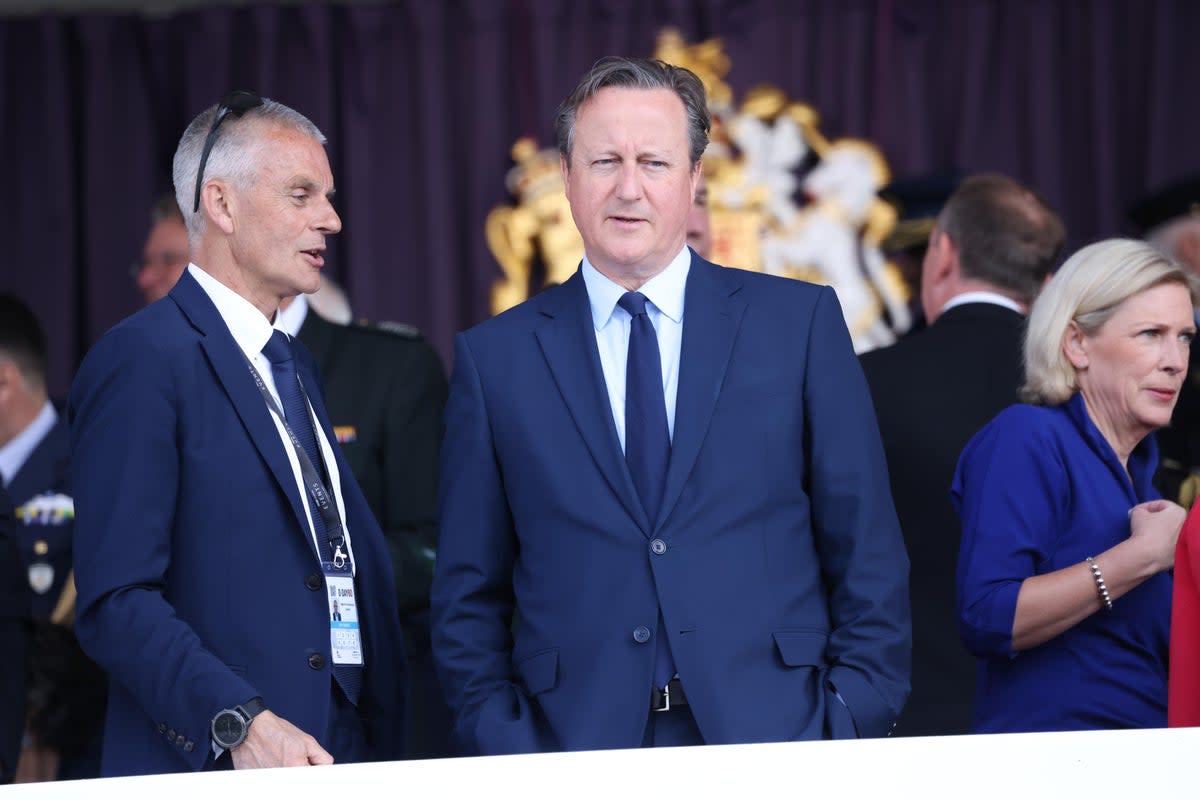 Foreign Secretary Lord David Cameron with BBC director-general Tim Davie at the D-Day 80th anniversary in Normandy (PA Wire)