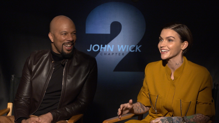 Common and Ruby Rose told Yahoo Movies about what it was like taking hits from Keanu Reeves. (Photo: Yahoo Movies)
