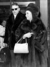 <p>Elizabeth Taylor and Richard Burton (i.e. Liz and Dick) were spotted leaving their hotel in Paris, but her quilted bag really stole the show. The pattern was widely popular and seen on practically every purse. </p>