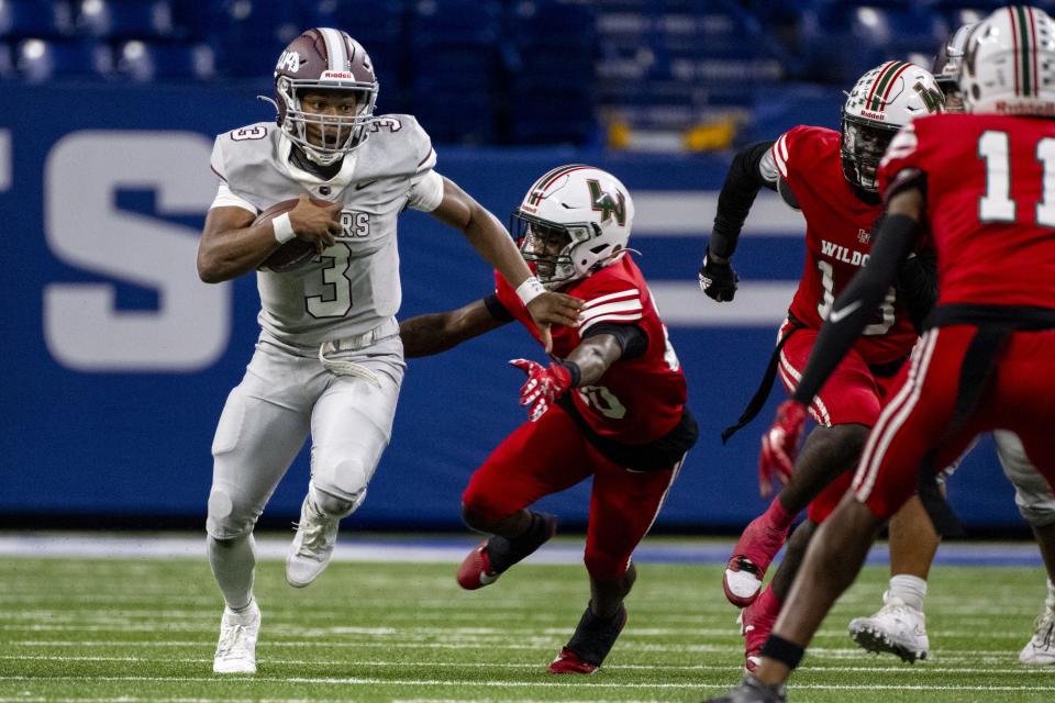 Lawrence Central High School senior Bryson Luter (3) makes a run upfield during the first half of an IHSAA varsity football game against Lawrence North High School, Friday, Sept. 1, 2023, at Lucas Oil Stadium in Indianapolis.