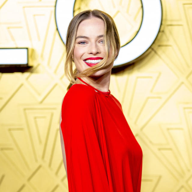 Margot Robbie Swaps Her Pastel Pink Outfits For the Littlest Red