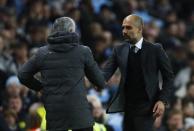 Britain Soccer Football - Manchester City v Manchester United - Premier League - Etihad Stadium - 27/4/17 Manchester City manager Pep Guardiola and Manchester United manager Jose Mourinho at the end of the match Action Images via Reuters / Jason Cairnduff Livepic