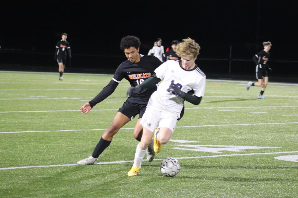 Gardner's No. 16 Tyson Trimel battles for ball control against Minuteman's No. 19 Dillon Schadinger on Monday, Nov. 6, 2023.