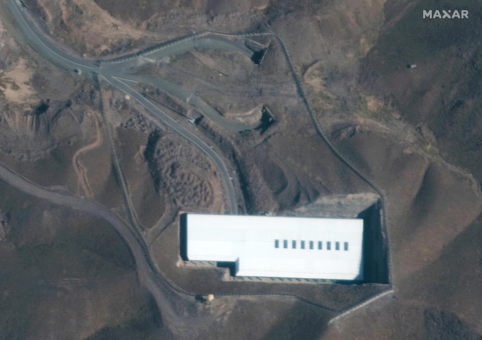 This Nov. 1, 2019, satellite image provided by provided by Maxar Technologies shows the Fordo nuclear facility, just north of the holy city of Qom in Iran. The resumption of activity at Fordo pushes the risk of a wider confrontation involving Iran even higher after months of attacks across the Middle East that the U.S. blames on Tehran. (Satellite image ©2019 Maxar Technologies via AP)