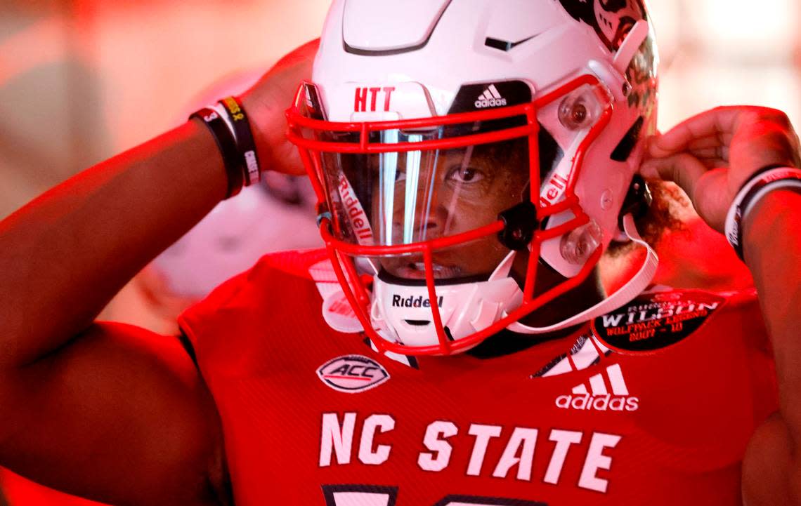 N.C. State quarterback MJ Morris (16) gets ready to head out onto the field before N.C. State’s game against Wake Forest at Carter-Finley Stadium in Raleigh, N.C., Saturday, Nov. 5, 2022.