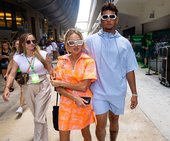 <p>Kym Illman/Getty</p> Patrick and Brittany Mahomes walk in Miami during F1 Grand Prix festivities on May 4, 2024