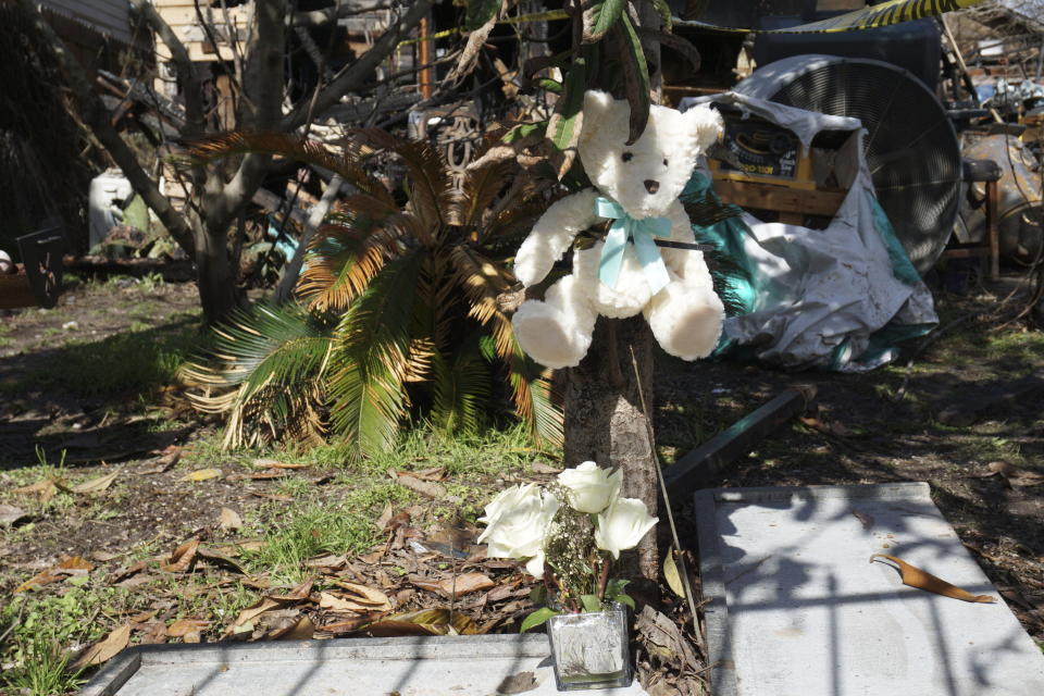 Damage is seen after a deadly house fire on Feb. 3, 2024, in Houston. A Texas mother and her 1-year-old son died after a fire engulfed their Houston home, but not before she was able to rescue her two other children, according to authorities. (Hana Ikramuddin/Houston Chronicle via AP)