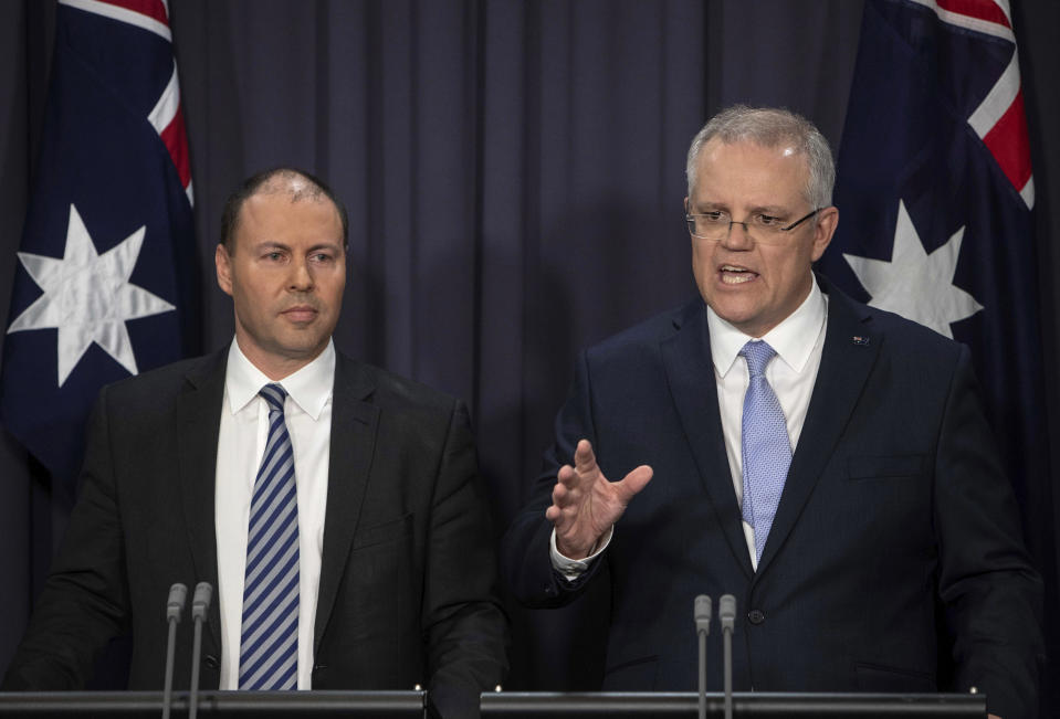 FILE - In this Aug. 24, 2018, file photo, Australia's next Prime Minister Scott Morrison, right, speaks next to Deputy Leader of the Liberal Party Josh Frydenberg during their press conference at Parliament House in Canberra. Australia. Saturday, May 18, 2019 is the last possible date that Morrison could have realistically chosen to hold an election. (AP Photo/Andrew Taylor, File)