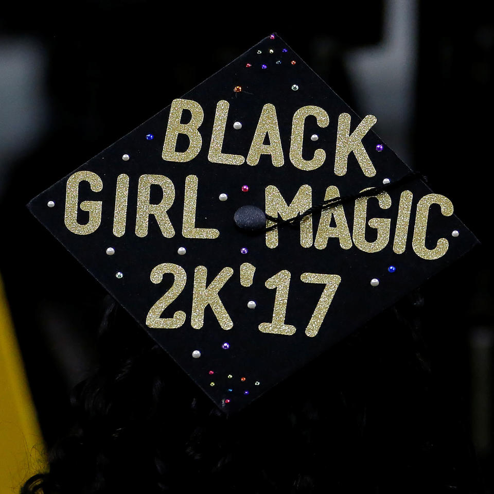 A graduate’s mortar board hat is pictured during a commencement for Medgar Evers College in the Brooklyn borough of New York City