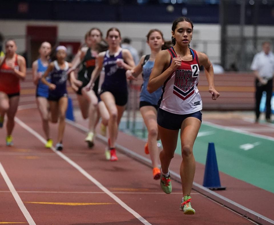 Peekskill's Juliette Salazar wins the 1000-meter run with a 3:02.46 time at the Westchester Co. Track & Field Championships at The Armory. Track & Field Center in New York on Saturday, January 28, 2023.