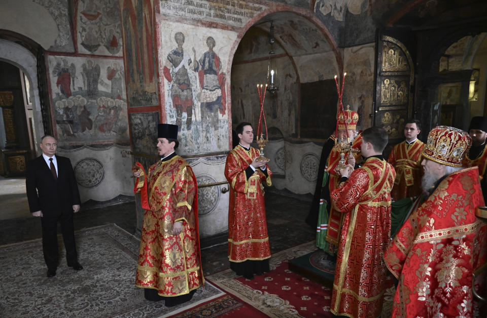 Russian President Vladimir Putin, left, attends a prayer service conducted by Patriarch Kirill of Moscow and all Russia following an inauguration ceremony at the Kremlin's Annunciation Cathedral in Moscow, Russia, Tuesday, May 7, 2024. (Alexey Maishev, Sputnik, Kremlin Pool Photo via AP)