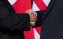 The handshake represents a potential turning point after decades of war and antagonism