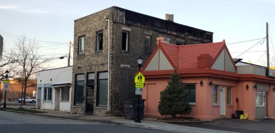 What remained of the downtown Waukesha building after an April 2019 , the second in two years, is pictured here shortly after the late-night blaze. It's the earlier fire, in March 2017, that has resulted in a federal indictment against the owner of a bar, Stage Off Main, for alleged arson and fraud. The building was more recently demolished by its new owner.