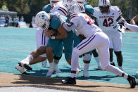 Coastal Carolina quarterback Grayson McCall scores against Massachusetts during the first half of an NCAA college football game on Saturday, Sept. 25, 2021, in Conway, S.C. (AP Photo/Chris Carlson)