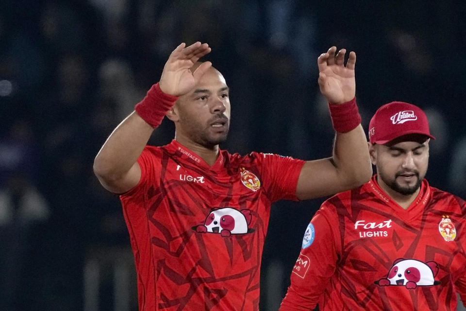 Islamabad United' Tymal Mills celebrates after taking the wicket during the Pakistan Super League T20 cricket match between Islamabad United and Karachi Kings, in Rawalpindi, Pakistan, Thursday, March 7, 2024. (AP Photo/Anjum Naveed)