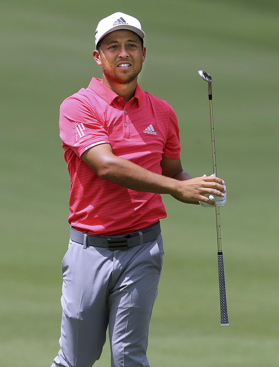 Xander Schauffele watches his fairway shot to the first green during the first round of the Tour Championship golf tournament at East Lake Golf Club on Thursday, Aug. 22, 2019, in Atlanta. (Curtis Compton/Atlanta Journal-Constitution via AP)