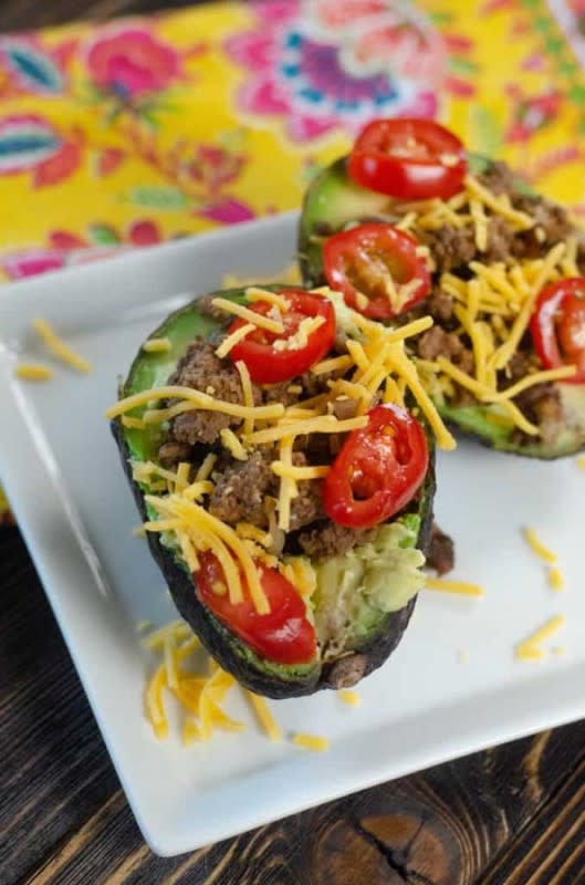 <p>Stylish Cravings</p><p>This low-carb taco stuffed avocado is a delicious recipe where you can enjoy all of the taco meat and all of the yummy toppings without the shell.</p><p><strong>Get the recipe: </strong><a href="https://stylishcravings.com/low-carb-taco-stuffed-avocado/" rel="nofollow noopener" target="_blank" data-ylk="slk:Low-Carb Taco Stuffed Avocado;elm:context_link;itc:0;sec:content-canvas" class="link rapid-noclick-resp"><strong>Low-Carb Taco Stuffed Avocado</strong></a></p>