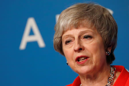 FILE PHOTO: Britain's Prime Minister Theresa May addresses the media during the G20 Leaders Summit in Buenos Aires, Argentina December 1, 2018. REUTERS/Carlos Garcia Rawlins