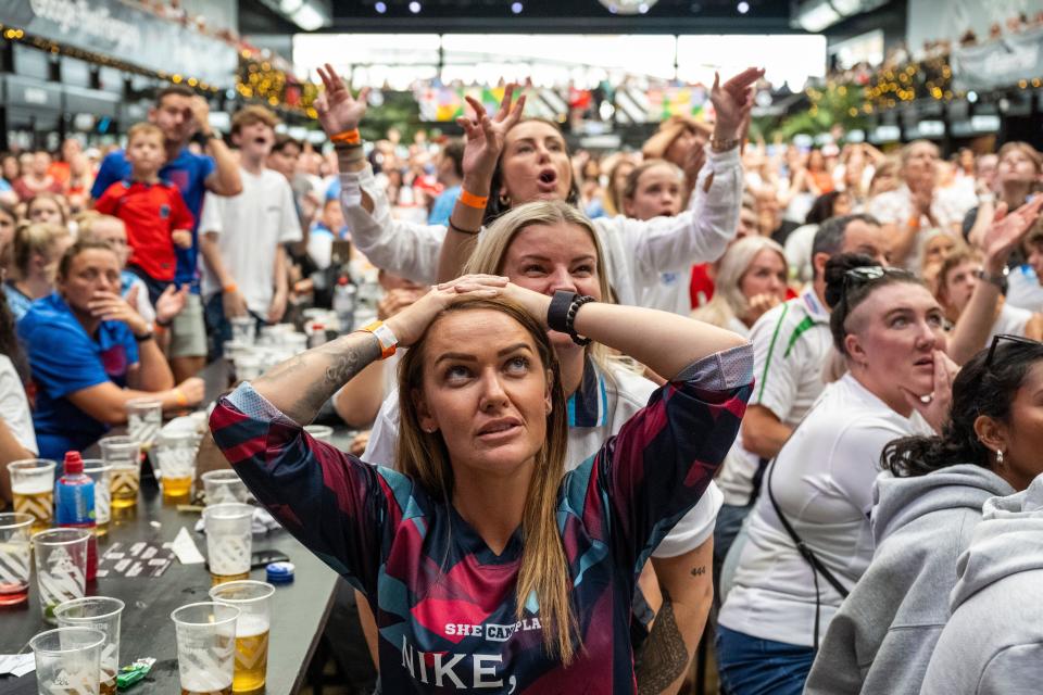 Lionesses fans, pictured here at Boxpark in South London, were left to drown their sorrows after the 1-0 defeat. (PA)