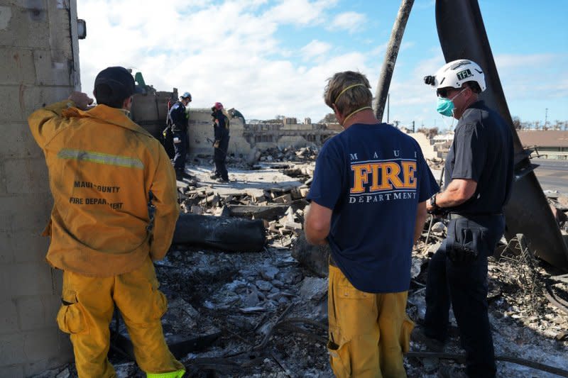 FEMA Urban Search and Rescue teams work with local fire departments and National Guard in Lahaina, Maui, on Wednesday. Photo by Dominick Del Vecchio/FEMA/UPI