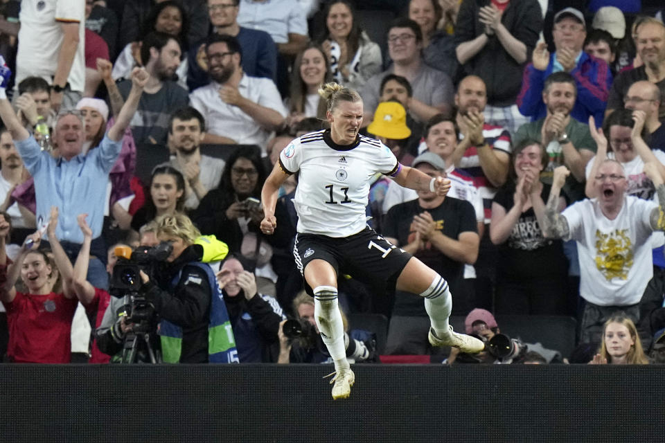 FILE - Germany's Alexandra Popp celebrates after scoring the opening goal during the Women Euro 2022 semifinal soccer match between Germany and France at Stadium MK in Milton Keynes, England, Wednesday, July 27, 2022. (AP Photo/Alessandra Tarantino, File)