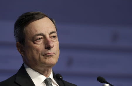 European Central Bank President Mario Draghi listens at a news conference during an informal meeting of Ministers for Economic and Financial Affairs (ECOFIN) in Riga, Latvia, April 24, 2015. REUTERS/Ints Kalnins