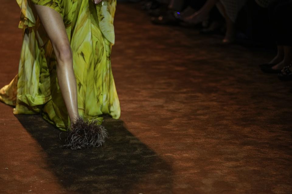 A model wears a creation as part of the Roberto Cavalli women's Spring Summer 2024 collection presented in Milan, Italy, Wednesday, Sept. 20, 2023. (AP Photo/Luca Bruno)