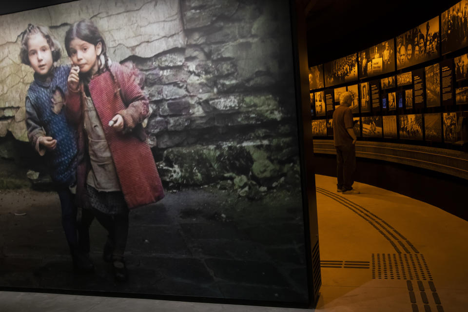 Photos from the permanent collection of the Holocaust Victims Memorial are on display on the first day it opened to the public in Rio de Janeiro, Brazil, Thursday, Jan. 19, 2023. The museum tells the stories of the thousands of people who took refuge in Brazil during the Holocaust. (AP Photo/Bruna Prado)