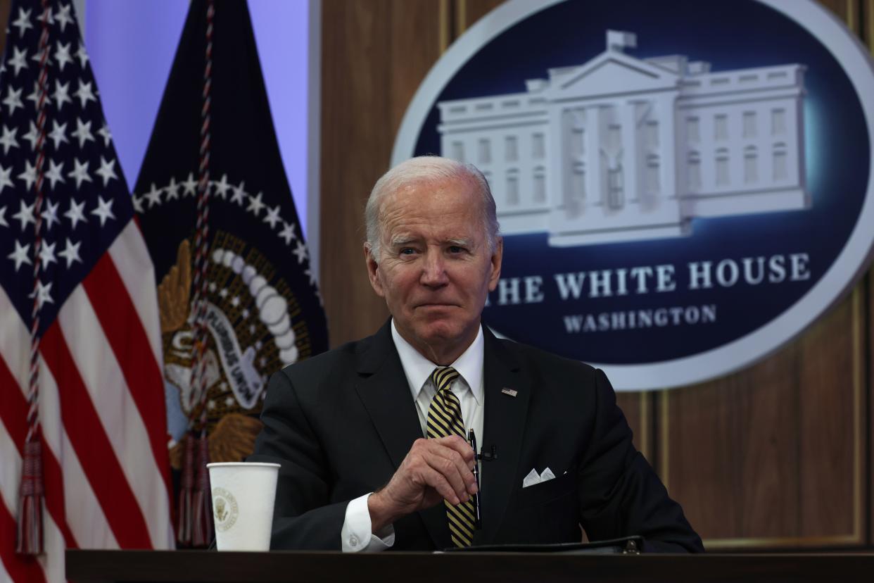 U.S. President Joe Biden listens at an event on bipartisan infrastructure legislation.