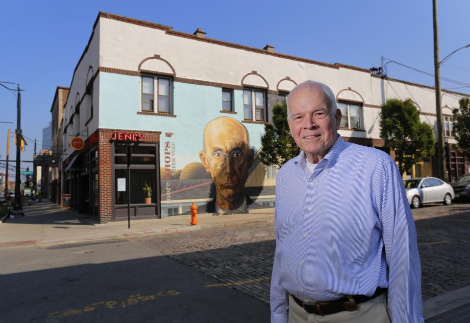 Sandy Wood, a pioneer in the development of the Short North, in front of one of the first buildings he bought and renovated.