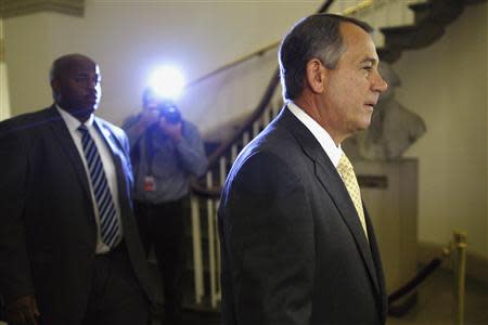 U.S. House Speaker John Boehner (R-OH) (R) arrives at the U.S. Capitol in Washington, October 3, 2013. REUTERS/Jonathan Ernst