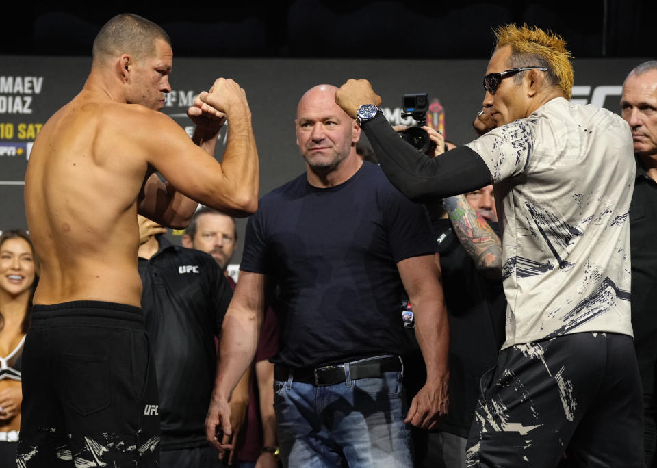 LAS VEGAS, NEVADA - SEPTEMBER 09: (L-R) Opponents Nate Diaz and Tony Ferguson face off during the UFC 279 ceremonial weigh-in at MGM Grand Garden Arena on September 09, 2022 in Las Vegas, Nevada. (Photo by Jeff Bottari/Zuffa LLC)