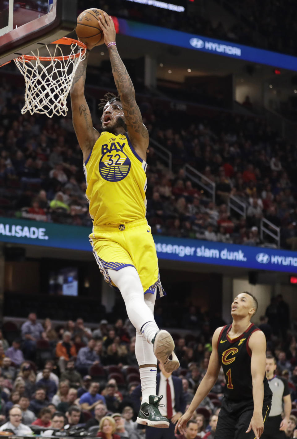 Golden State Warriors' Marquese Chriss (32) dunks the ball against the Cleveland Cavaliers in the second half of an NBA basketball game, Saturday, Feb. 1, 2020, in Cleveland. (AP Photo/Tony Dejak)