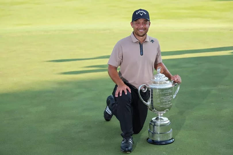 Xander Schauffele poses with the Wanamaker Trophy after winning his first major at the US PGA Championship at Valhalla