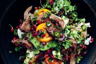 Pomegranate seeds add a pop of sweetness to this flavorful, tangy lamb and goat cheese salad. <a href="https://www.epicurious.com/recipes/food/views/lamb-goat-cheese-and-heirloom-tomato-salad?mbid=synd_yahoo_rss" rel="nofollow noopener" target="_blank" data-ylk="slk:See recipe.;elm:context_link;itc:0;sec:content-canvas" class="link ">See recipe.</a>