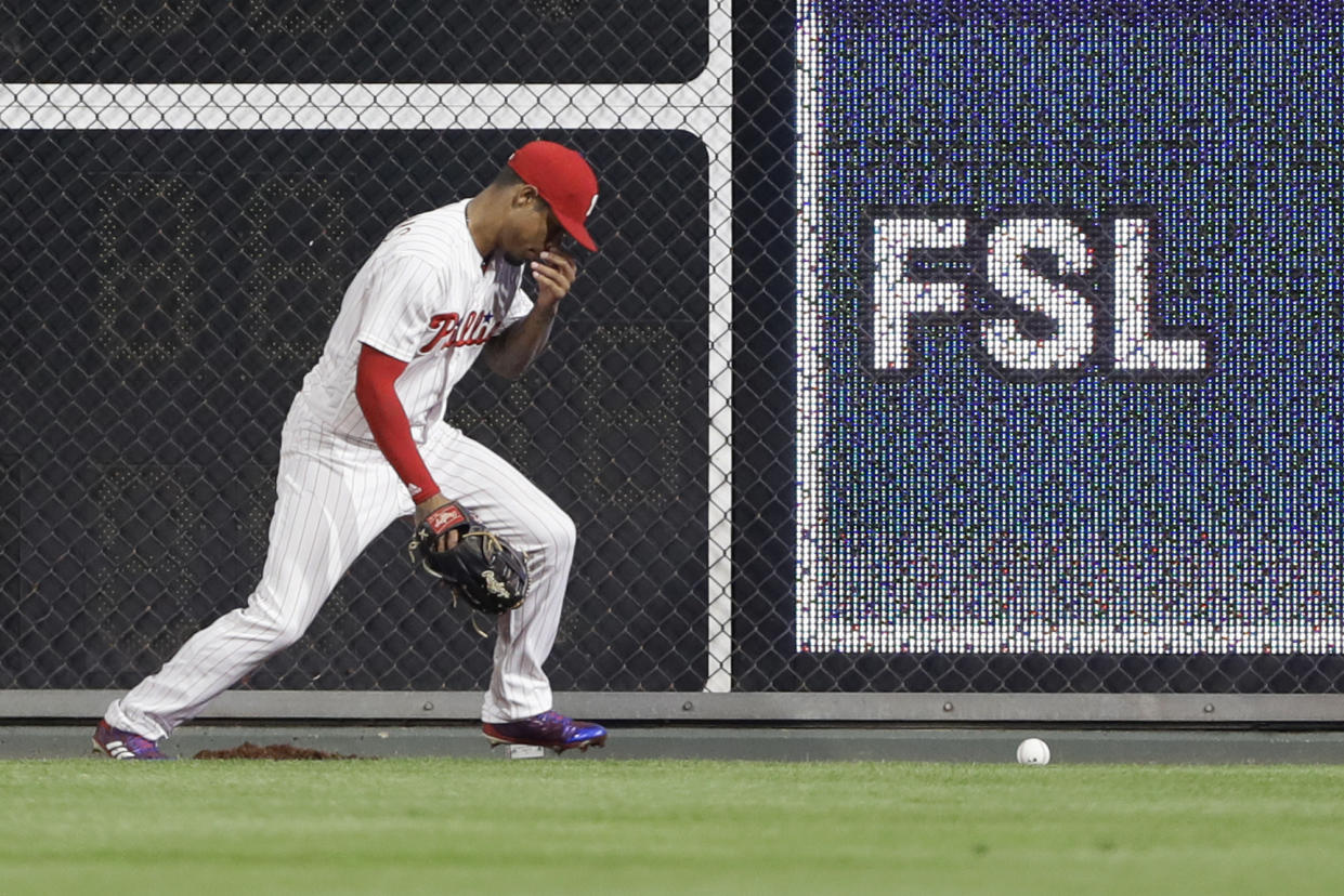 Nick Williams got hit in the nose after a ball bounced off the wall. (AP Photo)