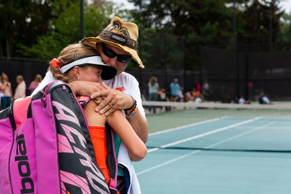 Skyridge’s Bella Lewis hugs her coach and father Jesse Lewis after winning the first singles finals against Layton’s Tia Christopulos during the 2023 6A Girls Tennis Championships at Liberty Park Tennis Courts in Salt Lake City on Saturday, Sept. 30, 2023. | Megan Nielsen, Deseret News