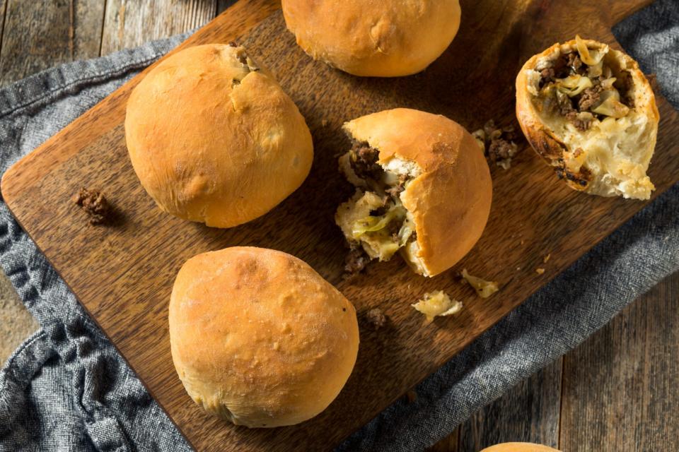 Bierocks are rolls stuffed with  ground beef, cabbage, onion, spice and brown mustard.