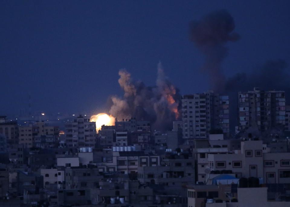An explosion at a residential tower in Gaza City caused by Israeli bombing raids in the northern Gaza Strip on Oct. 12.