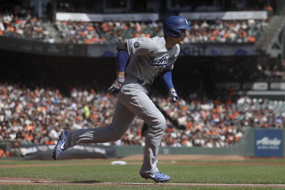 Los Angeles Dodgers' Corey Seager runs after hitting a three-run double against the San Francisco Giants during the first inning of a baseball game in San Francisco, Sunday, Sept. 29, 2019. (AP Photo/Jeff Chiu)