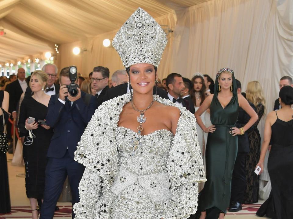 Rihanna at Met gala 2018 wearing pope hat