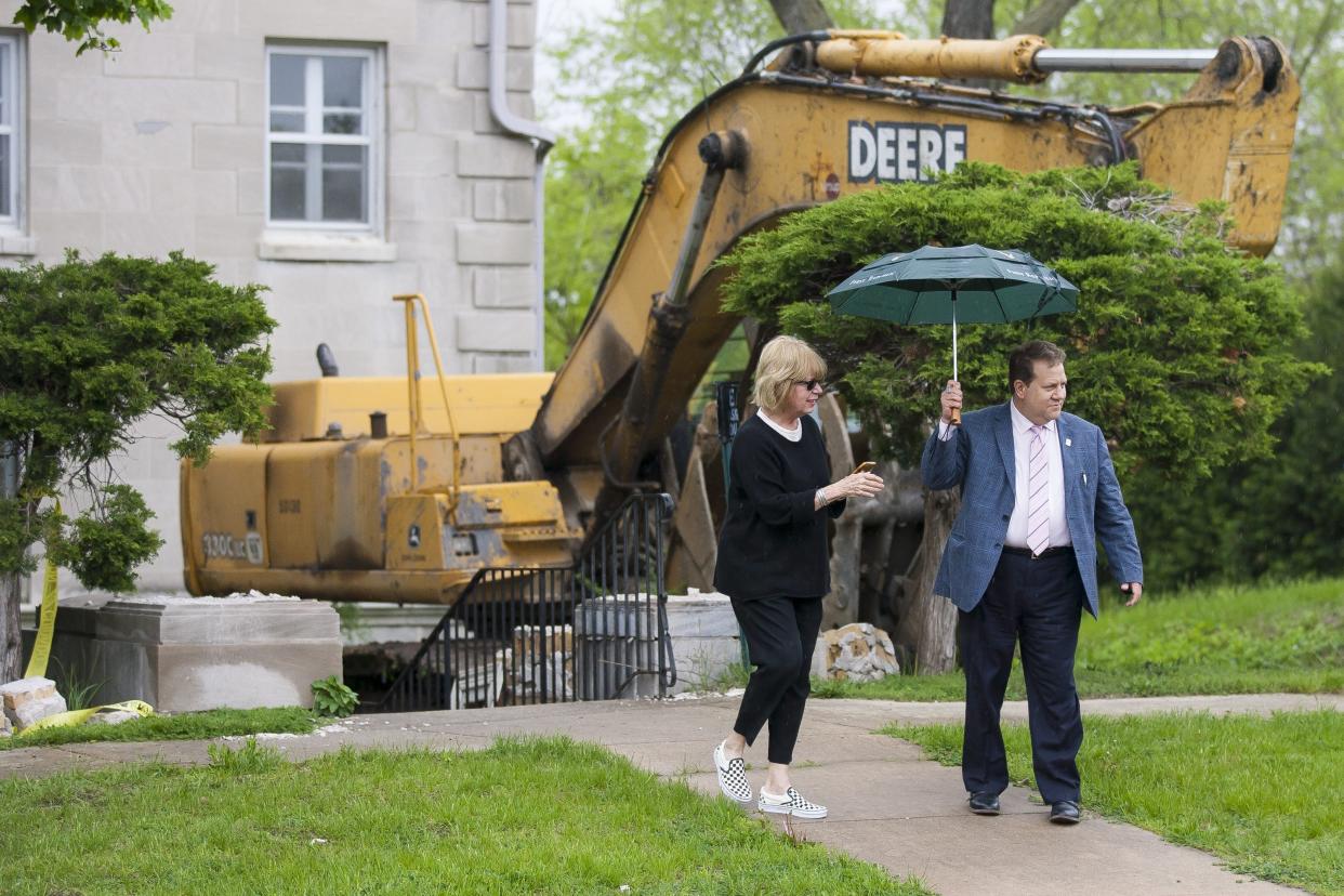 Rockford Ald. Mark Bonne, D-14, right, before he was elected to City Council, fought to save the former chancery of the Catholic Diocese of Rockford from demolition. In this file photo, he is seen outside the building on Friday, May 17, 2019, in the Signal Hill neighborhood in Rockford.