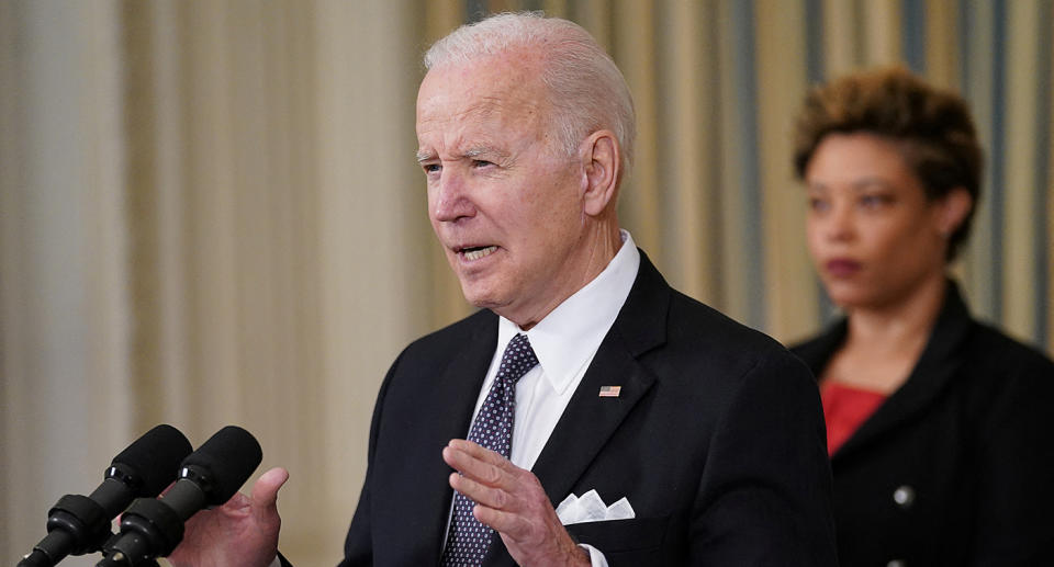 US President Joe Biden speaking at a podium into a microphone. Mr Biden went off script on Saturday during a speech in Poland saying Russian president Vladimir Putin should be removed from power.