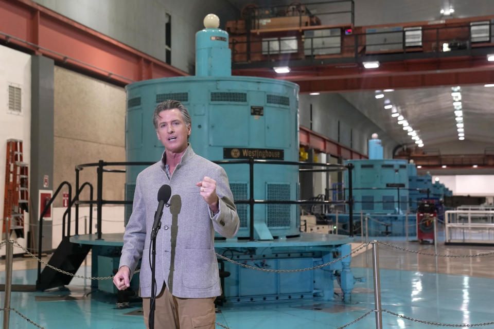 FILE - California Gov. Gavin Newsom discusses the effect of the drought on power generation after touring the Edward Hyatt Power Plant at the Oroville Dam, in Oroville, Calif., Tuesday, April 19, 2022. Facing possible electricity shortages, Newsom on Friday, April 29, 2022, raised the possibility that the state's sole remaining nuclear power plant might continue operating beyond a planned closing by 2025. Newsom has no direct authority over the operating license for the nuclear power plant, but Newsom spokeswoman Erin Mellon said "The Governor is in support keeping all options on the table to ensure we have a reliable (electricity) grid.(AP Photo/Rich Pedroncelli, File)